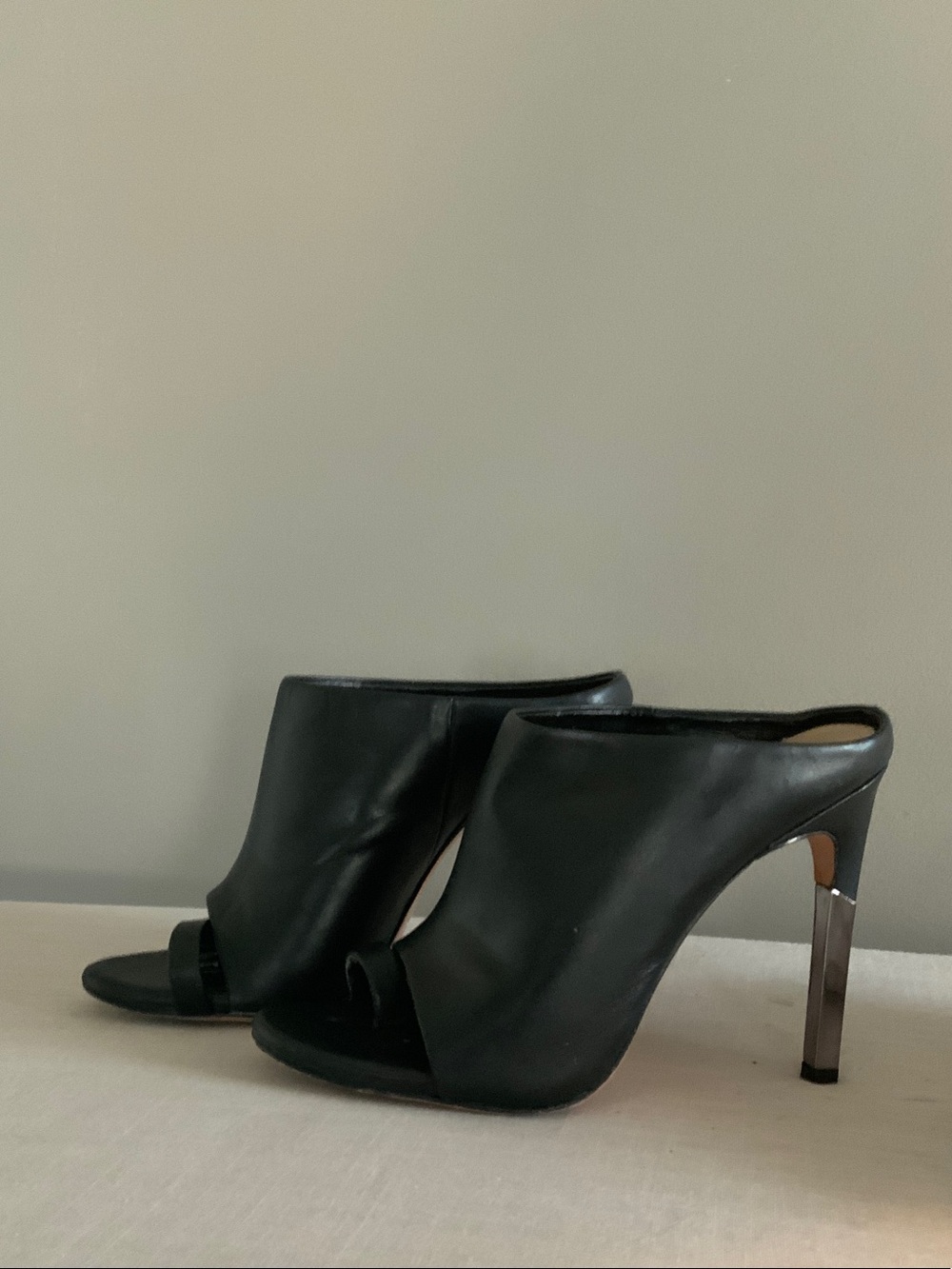 BCBGMaxAzria Black Leather Open-Toe Mule Heels with Metallic Slim Heel